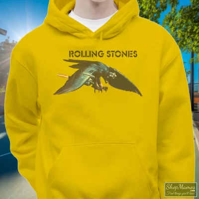 Men's 1975 Rolling Stones North American Tour Hoodie In Yellow, Front View On Dark Wood Background