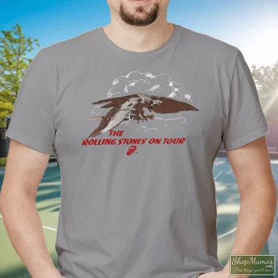 Men's 1975 Rolling Stones On Tour Concert Rock T Shirt In Sport Grey, Front View On Dark Wood Background