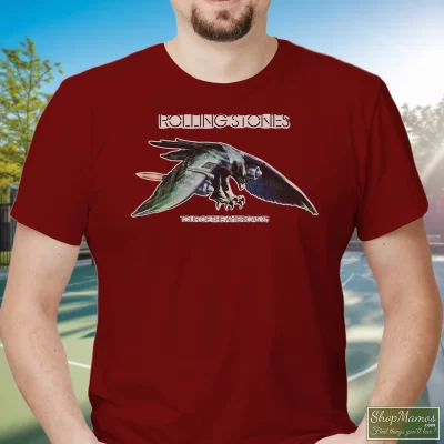 Men's 1975 Rolling Stones Tour Band Rock 70s 1970s T Shirt In Maroon, Front View On Light Wood Background