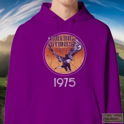1975 Rolling Stones Tour Of The Americas Band Shirt 2 Men's 1975 Rolling Stones Tour Of The Americas Band Hoodie In Purple, Front View On Light Wood Background