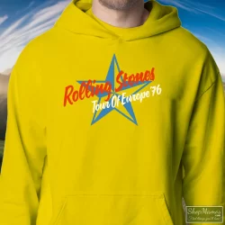 1976 Rolling Stones Tour Of Europe T Shirt 5 Men's 1976 Rolling Stones Tour Of Europe Hoodie In Yellow, Front View On Dark Wood Background