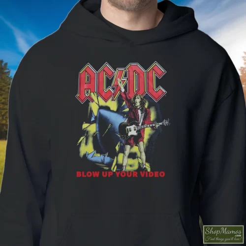 1988 Acdc Blow Up Your Video World Tour Men’s Hoodie – Black Front View On Light Wood Background Men's 1988 Acdc Blow Up Your Video World Tour Hoodie In Black, Front View On Light Wood Background