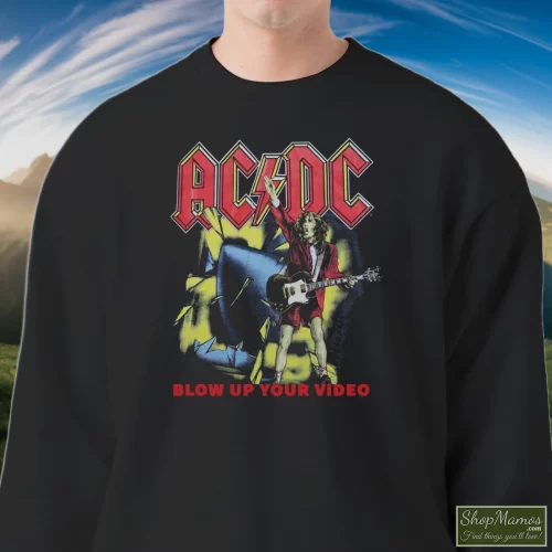 1988 Acdc Blow Up Your Video World Tour Men’s Sweatshirt – Black Front View On Light Wood Background Men's 1988 Acdc Blow Up Your Video World Tour Sweatshirt In Black, Front View On Light Wood Background