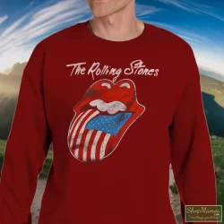 80s 1981 The Rolling Stones North American Rock Concert Tour Shirt 7 Men's 80s 1981 The Rolling Stones North American Rock Concert Tour Sweatshirt In Maroon, Front View On Light Wood Background