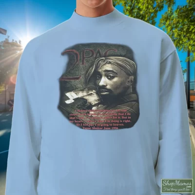 Men's 90s Tupac Shakur 2pac In Memory Of Rap Hip Hop Sweatshirt In Light Blue, Front View On Dark Wood Background