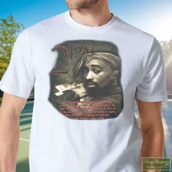90s Tupac Shakur Shirt 2pac In Memory Of Rap Hip Hop Shirt 5 Men's 90s Tupac Shakur 2pac In Memory Of Rap Hip Hop T Shirt In White, Front View On Dark Wood Background