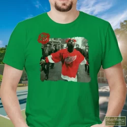 90s Tupac Shakur 2pac Wearing Detroit Red Wing Jersey Hip Hop Rap Hype Dope Swag Shirt 3 Men's 90s Tupac Shakur 2pac Wearing Detroit Red Wing Jersey Hip Hop Rap Hype Dope Swag T Shirt In Irish Green, Front View On Light Wood Background