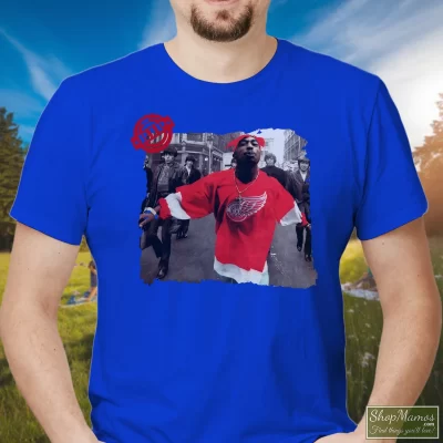 Men's 90s Tupac Shakur 2pac Wearing Detroit Red Wing Jersey Hip Hop Rap Hype Dope Swag T Shirt In Royal Blue, Front View On Light Wood Background