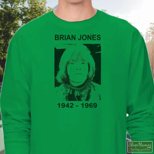 Brian Jones The Rolling Stones 1942 1969 Men’s Long Sleeve – Irish Green Front View On Light Wood Background Men's Brian Jones The Rolling Stones 1942 1969 Long Sleeve In Irish Green, Front View On Light Wood Background