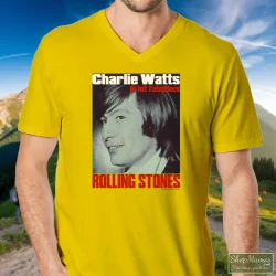 Charlie Watts Rolling Stones Drummer Shirt 9 Men's Charlie Watts Rolling Stones Drummer V Neck In Yellow, Front View On Dark Wood Background