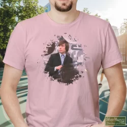 Charlie Watts Rolling Stones Shirt 2 Men's Charlie Watts Rolling Stones T Shirt In Light Pink, Front View On Dark Wood Background