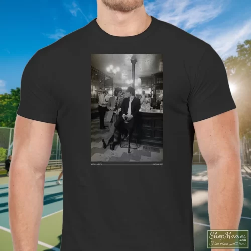 The Rolling Stones Fifty Years Mick & Keith London 1967 Men’s T Shirt – Black Front View On Light Wood Background Men's The Rolling Stones Fifty Years Mick & Keith London 1967 T Shirt In Black, Front View On Light Wood Background