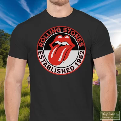 Men's The Rolling Stones Logo Est 1962 T Shirt In Black, Front View On Light Wood Background