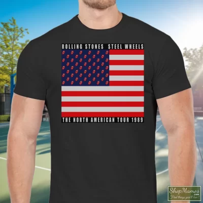 Men's The Rolling Stones Usa Flag Steel Wheels The North American Tour 1989 T Shirt In Black, Front View On Light Wood Background