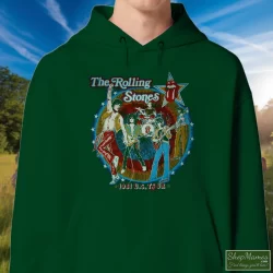 Thrashed Original 1981 The Rolling Stones Tatoo You Tour Shirt 2 Men's Thrashed Original 1981 The Rolling Stones Tatoo You Tour Hoodie In Forest Green, Front View On Light Wood Background