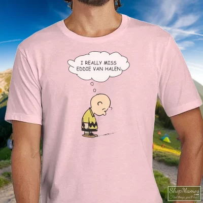 Men's I Really Miss Eddie Van Halen T Shirt In Light Pink, Front View On Dark Wood Background