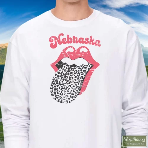 Leopard Tongue Rolling Stones Style Nebraska Huskers White Men’s Long Sleeve – White Front View On Dark Wood Background Men's Leopard Tongue Rolling Stones Style Nebraska Huskers White Long Sleeve In White, Front View On Dark Wood Background