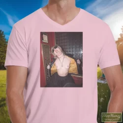 Miley Cyrus Rolling Stones Magazine Plastic Hearts Rock Shirt 10 Men's Miley Cyrus Rolling Stones Magazine Plastic Hearts Rock V Neck In Light Pink, Front View On Dark Wood Background