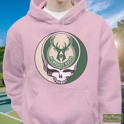 Milwaukee Bucks Basketball Grateful Dead Steal Your Face T-Shirt 5 Men's Milwaukee Bucks Basketball Grateful Dead Steal Your Face Hoodie In Light Pink, Front View On Dark Wood Background