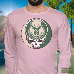 Milwaukee Bucks Basketball Grateful Dead Steal Your Face T-Shirt 6 Men's Milwaukee Bucks Basketball Grateful Dead Steal Your Face Long Sleeve In Light Pink, Front View On Dark Wood Background