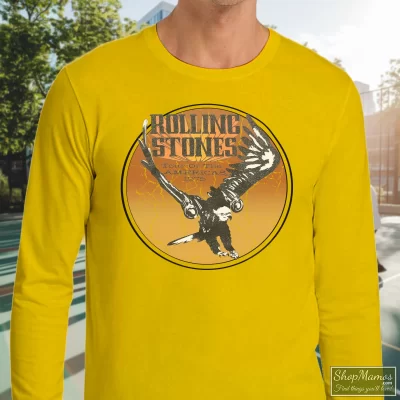 Men's Rolling Stones 1975 Tour Of The Americas Long Sleeve In Yellow, Front View On Dark Wood Background