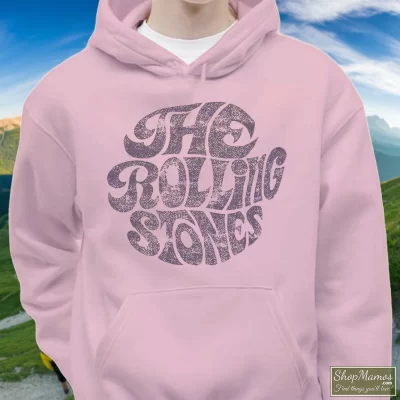 Men's Rolling Stones Distressed Hoodie In Light Pink, Front View On Dark Wood Background