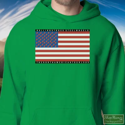 Men's Rolling Stones Steel Wheels 1989 Tour Hoodie In Irish Green, Front View On Light Wood Background