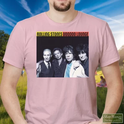 Men's Rolling Stones Voodoo Lounge Tour T Shirt In Light Pink, Front View On Dark Wood Background