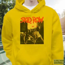 Skid Row 1991 Slave To The Grind Tour Shirt 5 Men's Skid Row 1991 Slave To The Grind Tour Hoodie In Yellow, Front View On Dark Wood Background