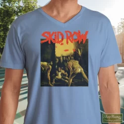 Skid Row 1991 Slave To The Grind Tour Shirt 9 Men's Skid Row 1991 Slave To The Grind Tour V Neck In Light Blue, Front View On Dark Wood Background
