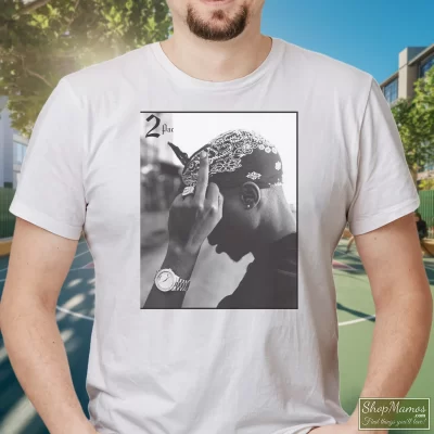 Men's Tupac Shakur Black Middle Finger T Shirt In White, Front View On Dark Wood Background