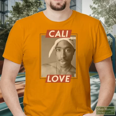 Men's Tupac Shakur Rapper Cali Love T Shirt In Orange, Front View On Dark Wood Background