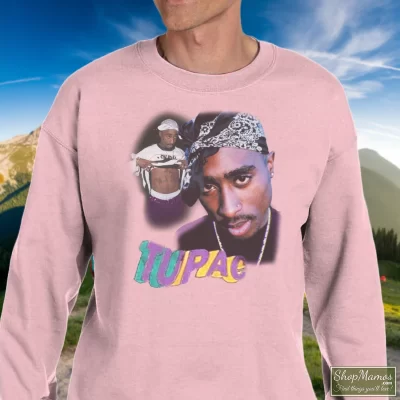Men's Tupac Shakur Sweatshirt In Light Pink, Front View On Dark Wood Background