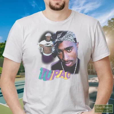 Men's Tupac Shakur T Shirt In White, Front View On Dark Wood Background