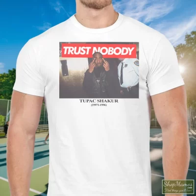 Men's Tupac Shakur Trust Nobody T Shirt In White, Front View On Dark Wood Background