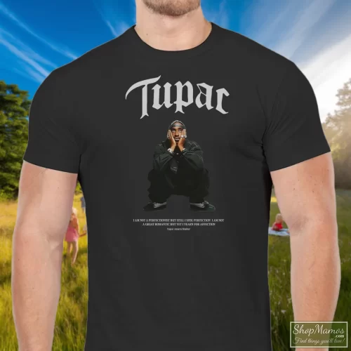 Must Have Tupac Shakur Vintage Men’s T Shirt – Black Front View On Light Wood Background Men's Must Have Tupac Shakur Vintage T Shirt In Black, Front View On Light Wood Background