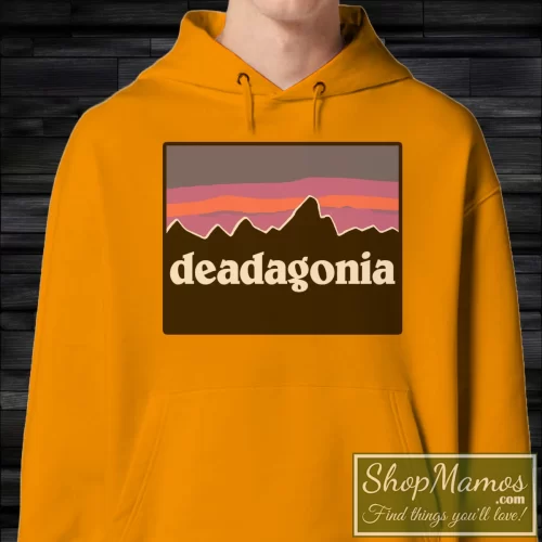 Vintage 90s Grateful Dead X Patagonia Men’s Hoodie – Orange Front View On Dark Wood Background Men's Vintage 90s Grateful Dead X Patagonia Hoodie In Orange, Front View On Dark Wood Background