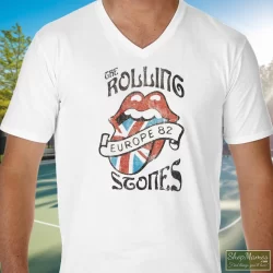 Vintage Rolling Stones Europe 82 Shirt 1 Men's Vintage Rolling Stones Europe 82 V Neck In White, Front View On Dark Wood Background