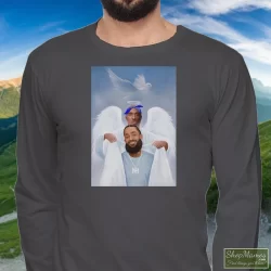 Two Angels Tupac Shakur And Nipsey Hussle Shirt 2 Men's Two Angels Tupac Shakur And Nipsey Hussle Long Sleeve In Charcoal, Front View On Dark Wood Background