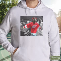 World Star Hiphop Tupac Shakur 2pac Detroit Spitting Hip Hop Rap Shirt 7 Men's World Star Hiphop Tupac Shakur 2pac Detroit Spitting Hip Hop Rap Hoodie In White, Front View On Dark Wood Background