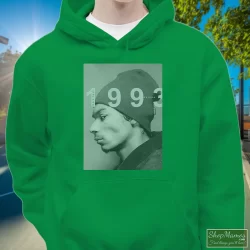 Young Snoop Dogg 1993 Shirt 1 Men's Young Snoop Dogg 1993 Hoodie In Irish Green, Front View On Light Wood Background