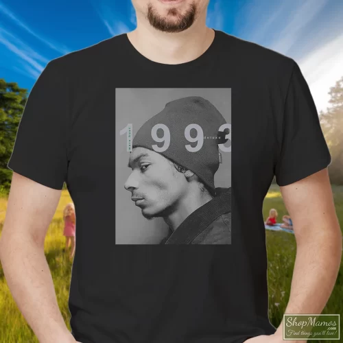Young Snoop Dogg 1993 Men’s T Shirt – Black Front View On Light Wood Background Men's Young Snoop Dogg 1993 T Shirt In Black, Front View On Light Wood Background