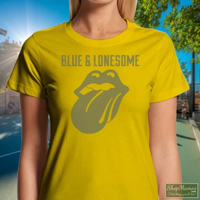 Women's 1972 Rolling Stones Blue And Lonesome T Shirt In Yellow, Front View On Dark Wood Background