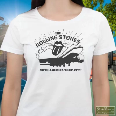 Women's 1972 Rolling Stones North American Tour T Shirt In White, Front View On Dark Wood Background
