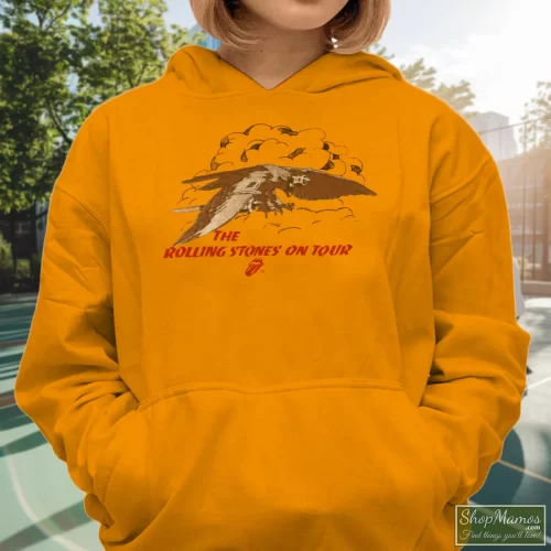 1975 Rolling Stones Concert Tour Rock Women’s Hoodie – Orange Front View On Dark Wood Background Women's 1975 Rolling Stones Concert Tour Rock Hoodie In Orange, Front View On Dark Wood Background