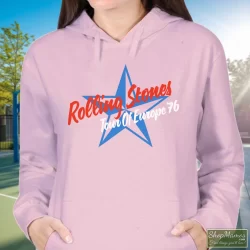 1976 Rolling Stones Tour Of Europe T Shirt 1 Women's 1976 Rolling Stones Tour Of Europe Hoodie In Light Pink, Front View On Dark Wood Background
