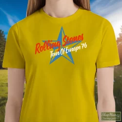 1976 Rolling Stones Tour Of Europe T Shirt 3 Women's 1976 Rolling Stones Tour Of Europe T Shirt In Yellow, Front View On Dark Wood Background