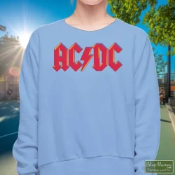 1979 ACDC Highway To Hell Tour Shirt 1 Women's 1979 Acdc Highway To Hell Tour Sweatshirt In Light Blue, Front View On Dark Wood Background