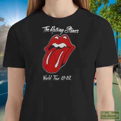 Women's 1981 Rolling Stones Tattoo You World Tour T Shirt In Black, Front View On Light Wood Background