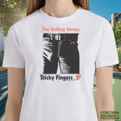 Women's 1989 Rolling Stones Steel Wheels Sticky Fingers White T Shirt In White, Front View On Dark Wood Background